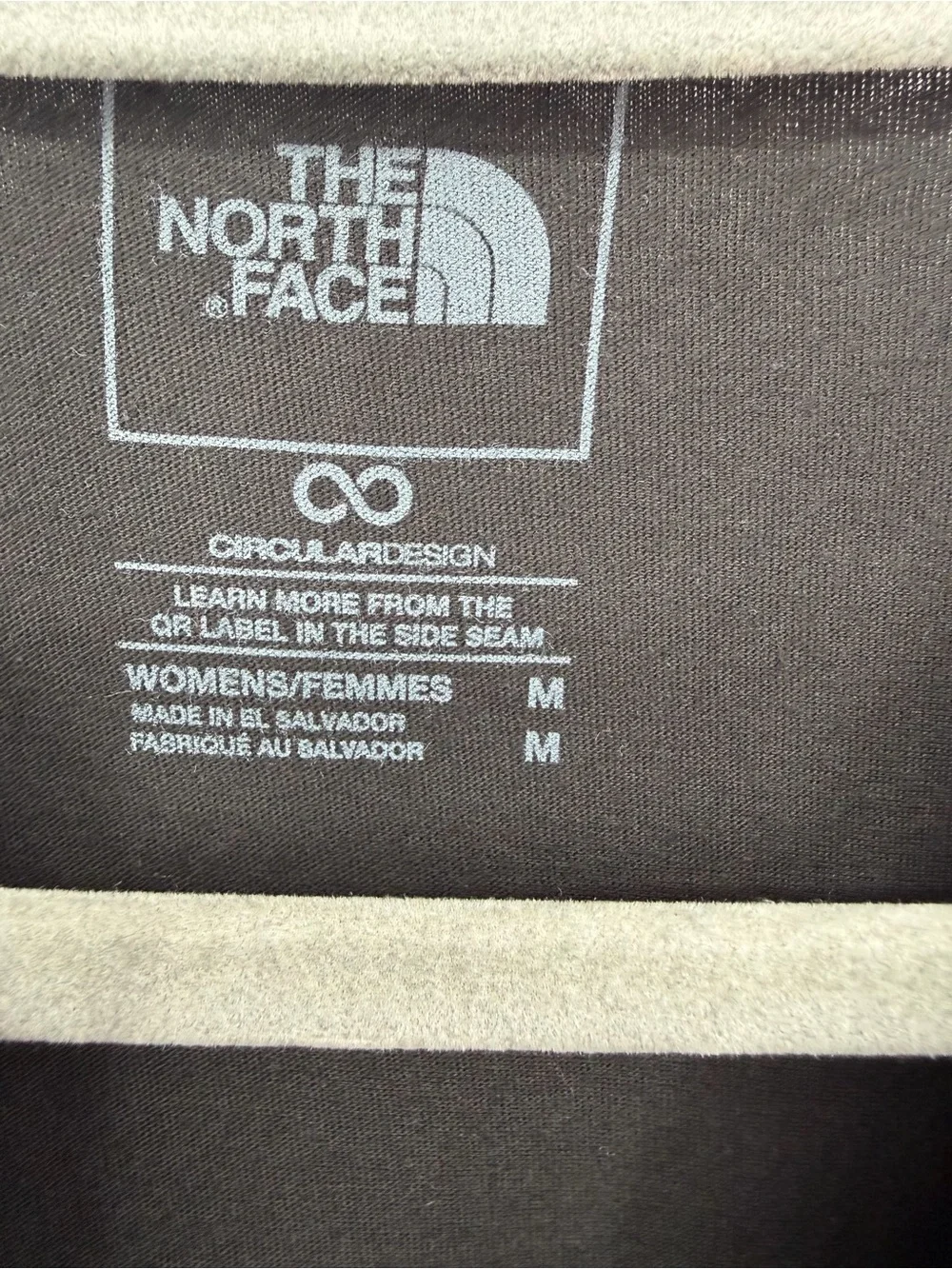 The North Face Black Tee with White Logo and Orange Tag - Picture 5 of 6